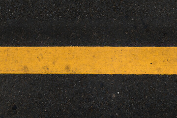 Fototapeta premium Asphalt texture background yellow line road surfaces