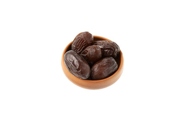 Iranian dates balanced in ceramic bowl on white background. Natural substitute for sweets. Healthy food during religious fasting. Dried fruits contain many vitamins and trace elements
