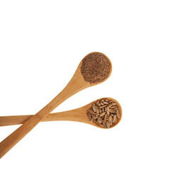 Milk Thistle powder and Silybum marianum seeds in wooden spoons on white background. Natural antioxidant. Herbal superfood for aiding liver function