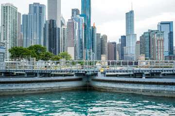 Obraz premium Chicago, Illinois, USA, July 1, 2022. View of the city from a riverboat cruise. Chicago River Lock.