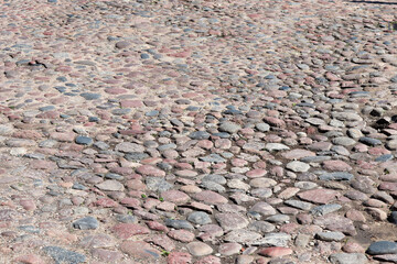 Stara kamienista droga w europie starożytnej. Kocie łby.  - obrazy, fototapety, plakaty