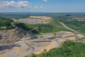 Mine with Green Mountains and Blue Sky