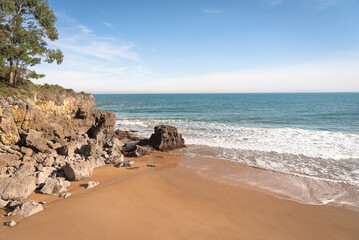 Beautiful quiet sandy beach - relax on summer vacation and travel concept, Noja, Cantabria, Spain