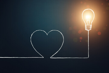 Love concept idea icon. Light bulb with heart shaped wire. Copy space. Idea symbol