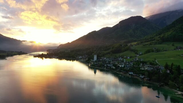 Wolfgangsee panorama during sunset. Scenic sunset close to St. Wolfgang in the Salzkammergut region in Austria.