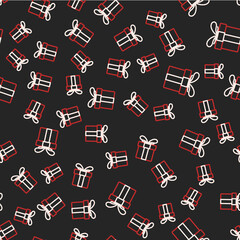 Line Gift box icon isolated seamless pattern on black background. Merry Christmas and Happy New Year. Vector
