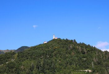 above the hill is the church of San Pietro in the region called CARNIA in northern Italy