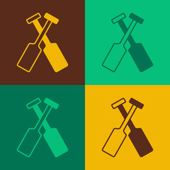 Pop art Crossed oars or paddles boat icon isolated on color background. Vector