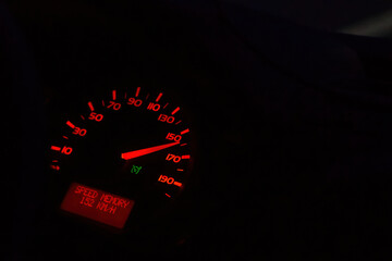 Close up shot of a speedometer in a car. high speed. close up