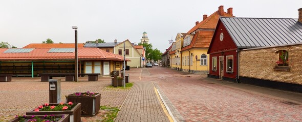 An empty street in Ventspils old town, Latvia.. Historic and traditional architecture. Summer vacations, travel destinations, landmarks, sightseeing, culture themes © Alex Stemmer