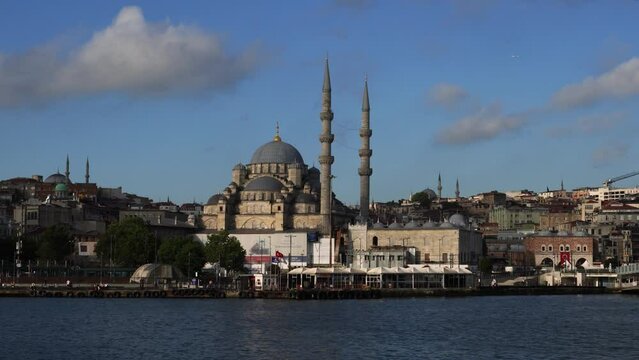 Istanbul, Turkey - June 18 2022: The New Mosque (Turkish: Yeni Cami, originally named the Valide Sultan Mosque, Turkish: Valide Sultan Camii) located in the Emin&ouml;n&uuml; quarter.