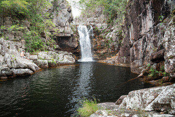 Beautiful view to wild and rocky cerrado waterfall