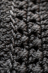 detalle de bolsa tejida negra, close up