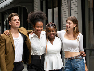 Friendship African American Caucasian black ethnic person people woman man group teamwork friendship man woman female male girl boy young adult outdoor happy together happy smile vacation multiracial 