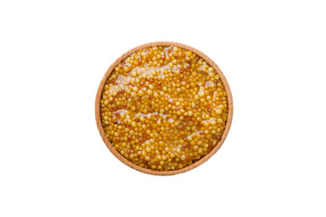 Bowl of Dijon mustard sauce isolated on white background. top view