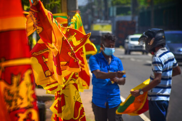 A vendor selling Sri Lankan flag on Independence day