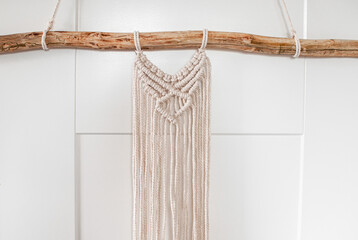 threads in the style of macrame on white background