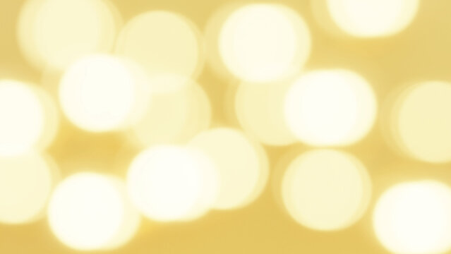 金色の背景に白色の光。ぼやけた光。	