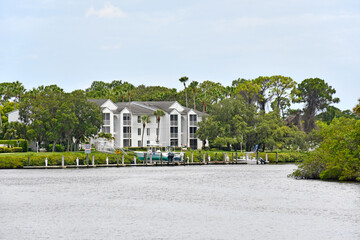 Apartment buildings and boat docks along the St Lucie River estuary in Port St Lucie, Florida