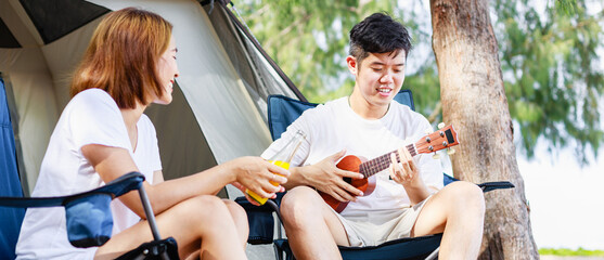 Couple relaxing camping. happy holiday on the beach. Young couple camping and resting