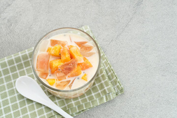 Mango Cheese Milk, a dessert made from jelly, nata de coco, basil seed, sweet mango, cream cheese and milk.

