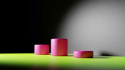It is a side view of an empty room where you can see three pink cylinders that are illuminated by a circular light from the front. The floor is green and the wall is black. Product display. 