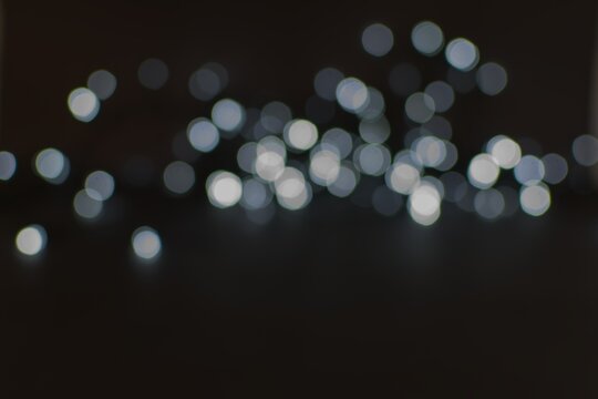 Background image with black and white bokeh lights.