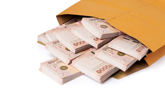 Stack of one million thai baht banknote money in bag isolated on white background.