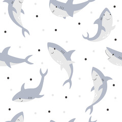 Cute playful vector sharks on a seamless childish pattern. Vector fish animal in the background
