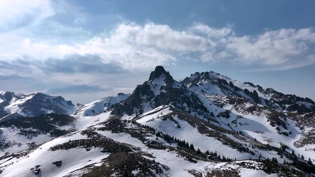 Aerial drone footage of Ciucas Mountain summit. Top of the mountain. Sunny day