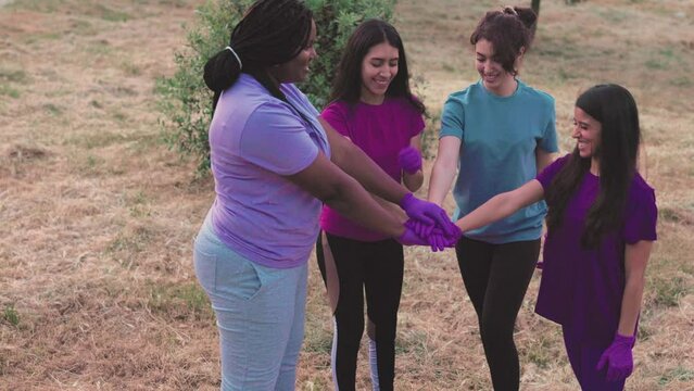 Plogging garbage volunteering multiethnic group. ecology plastic trash social services cleaning