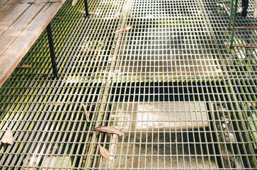 the second floor made of iron with a checkered pattern
