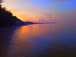 Fototapeta na wymiar Sunset over the sea (Bangsring Underwater Beach Banyuwangi Indonesia)