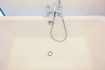 hydrant shower with bathtub in bathroom