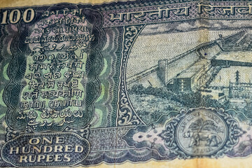 Rare Old One Hundred Rupee notes combined on the table, India money on the rotating table. Old Indian Currency notes on a rotating table, Indian Currency on the table