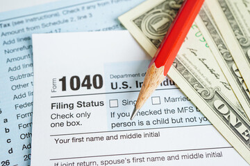 Obraz premium Tax form 1040 U.S. Individual Income Tax Return, business finance concept.