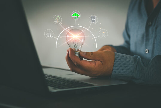 Energy Conservation Concept.Energy saving collaboration, Alternative energy use and the changing world, electric car in concept of green energy and eco power produced reduce CO2 emission.