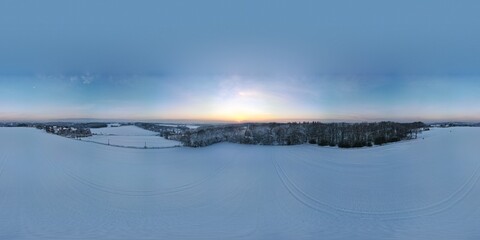 Fototapeta na wymiar Snowy Windgarten Ennepetal Droneshot Sunset