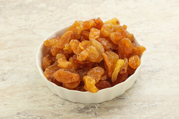 Sweet yellow raisin in the bowl