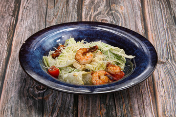 Traditional Caesar salad with prawn