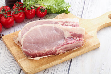 Raw pork t-bone steak for grill