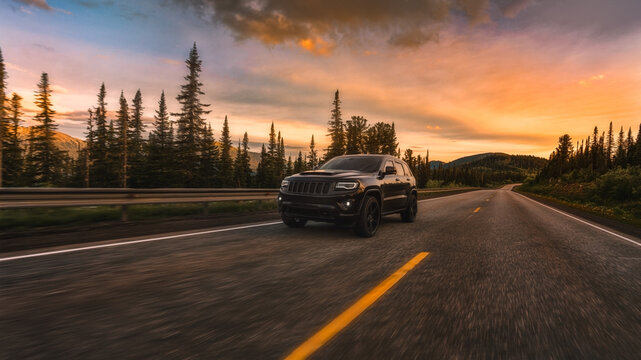 Moscow, Russia - July 01, 2022 Jeep grand cherokee wk2 Trackhawk. car in the mountains at sunset