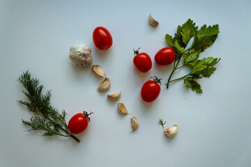 vegetables and greens on a white background flat lay