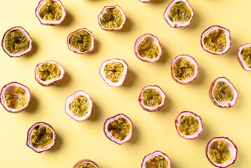 Fresh passion fruit on yellow background, Tropical fruit in summer season, Flat lay