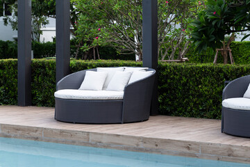 Modern sofa and furniture with pool.