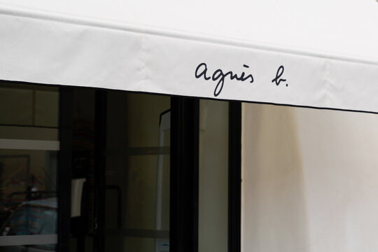 agnes b sign text and logo brand of store french luxury shop signage