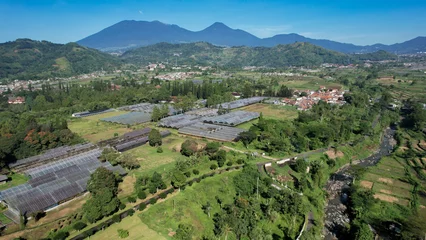 Foto op Canvas Aerial view of The Taman Bunga Nusantara or Flower Garden Nusantara, a travel destination located in Cianjur. Cianjur, Indonesia, July 6, 2022 © syahrir