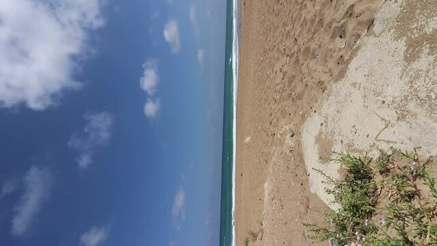 time lapse of light clouds, above the sea waves of Atlit coast in northern Israel