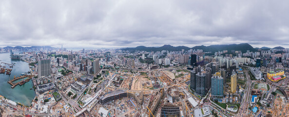 Epic panorama of huge construction site in the Kai Tak area, Kowloon, Hong Kong, daytime
