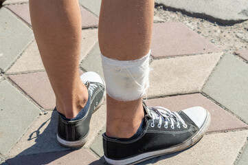 Fototapeta na wymiar bandaged male leg